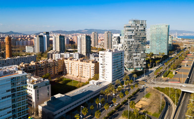 Fototapeta premium Barcelona, Spain - March 05, 2019: Modern high-rise buildings in the coastal residential areas of Diagonal Mar and Poblenou