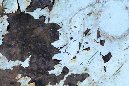 Rusty metal surface with peling paint texture