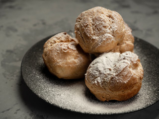 Delicious tender profiteroles with cream