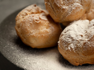 Delicious tender profiteroles with cream