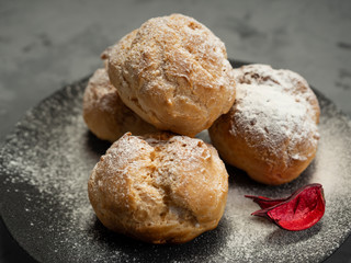 Delicious tender profiteroles with cream