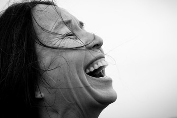 Close up of laughing woman, black and white