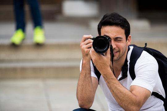 Man taking camera photo, Tokyo, Tokyo, Japan