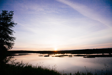 Naklejka na ściany i meble Sunset on the river