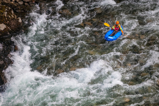 Evan Howard, an avid Explorer and adventurer, navigates a white water section of the Chehalis River on a packraft.