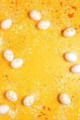 Easter greeting background with eggs paint splashes