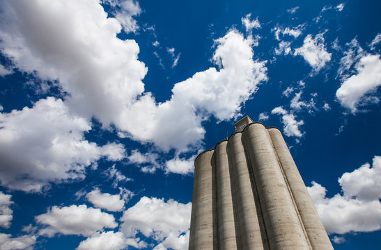 Grain silos under blue sky with clouds, Palouse, Washington State, USA