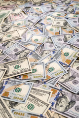 Background of 100 new and old dollar bills