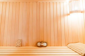 Fototapeta na wymiar Sauna room with traditional sauna accessories