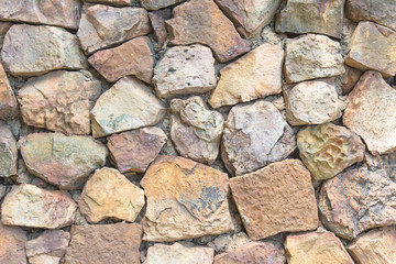 Seamless brown pattern of decorative grey slate stone wall.