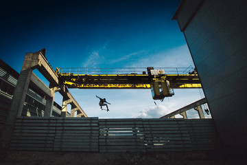 Skateboarder Is Jumping Over Concrete Slabs In Poland