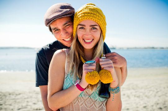 Portrait Of Young Couple On Beach