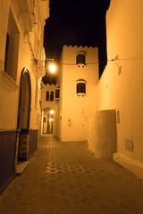 Illuminated Night streets of Asilah Medina, on Atlantic Coast in Morocco