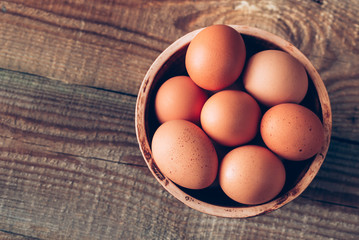 Bowl of raw chicken eggs
