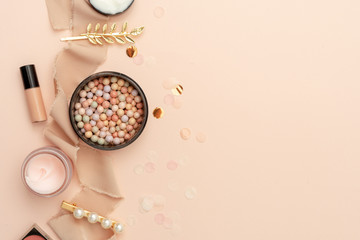 Flat lay composition with cosmetic products on pastel background. Beauty trendy pearl accessories hair clip. Top view. Copy space fot text.
