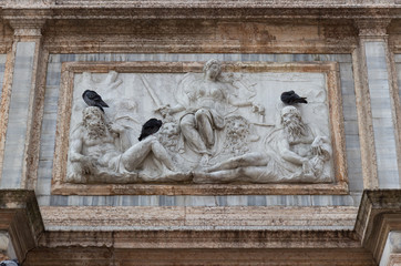 Sculpture at the base of the bell tower of San Marco, Venice