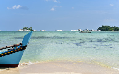 Fototapeta na wymiar Touristic boats and small rocky islands the northwest side of Belitung Island, ındonesia