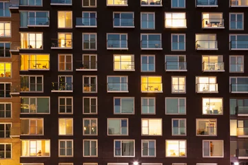 Foto op Plexiglas Modern apartment block at dusk © conceptualmotion
