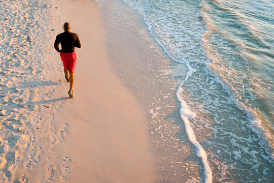 Man Running On The Beach, From Above