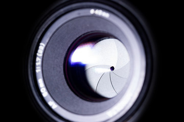 Lens aperture low light photo. Aperture blades is clean. Stock photo with blurred foreground....