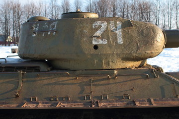 Old battle Tank on the snow, participated in the 2nd world war.