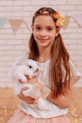 Beautiful brunette kid demonstrating her sincere emotions