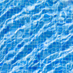 water ripples in swimming pool, blue background