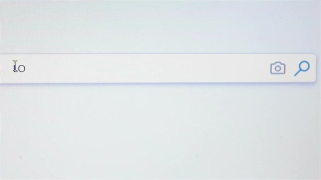 Internet user writes the word love in the search bar.Browser search bar.