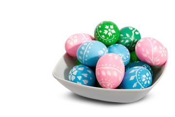 Easter plate with Easter eggs on wnite background.