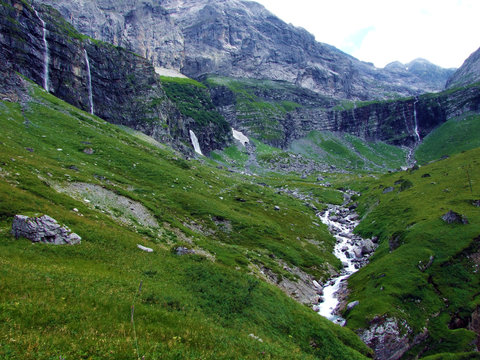 The Alpine Valley of Im Loch at the Glarus Alps mountain range - Canton of Glarus, Switzerland