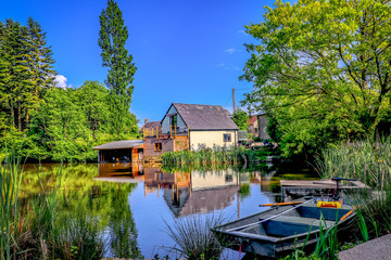 Fototapeta na wymiar French dream. Summer house by the beautiful lake. 
