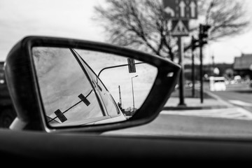 Reflection in a car mirror