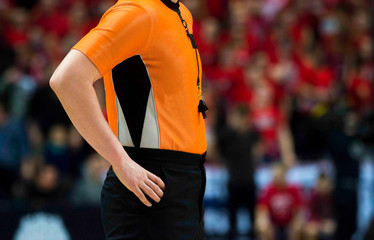 Referee with whistle
