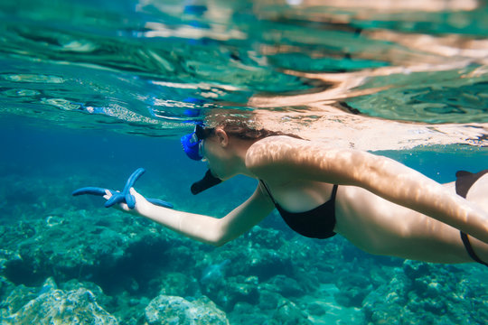 Indonesia, Bali, young woman snorkeling
