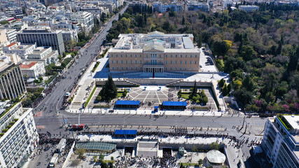 Aerial drone photo of Greek Parliament in Syntagma square during annual parade of Greek independence day on March 25, Athens, Attica, Greece