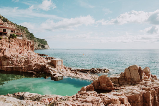 Swimming pool on rocky seashore, Es Cau, Costa Brava, Catalonia, Spain