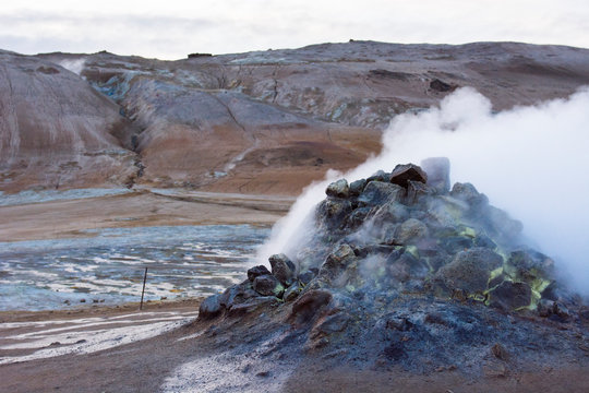 Active steam spring with Namafjall in the background, at Hverar ndor Hverir Geothermal Area, at Namaskard Pass in Iceland.