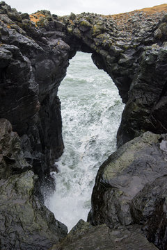 Coastal natural arch, Arnastapi, Iceland