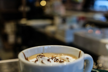 Cappuccino coffee with blur background