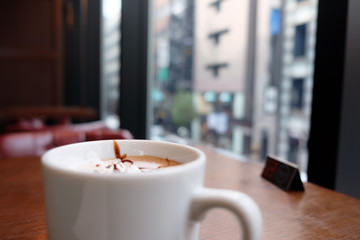 Cappuccino coffee with blur background