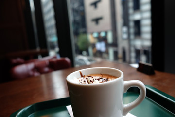 Cappuccino coffee with blur background