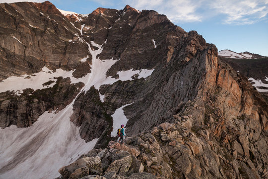 A climber approaches the Four Aces on Ypsilon Mountain, Rocky Mountain National Park, Colorado.