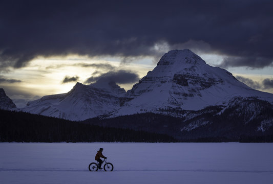 Person Riding Fat Bike On Frozen Lake