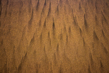 formas dejadas por el mar sobre la arena de la playa