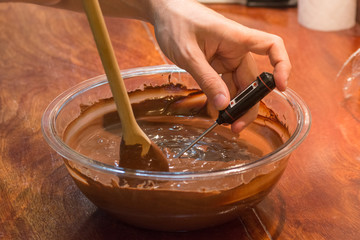 Part of the process of making homemade artisan chocolate sweets with different fillings for a special ocassion: valentine's day, a birthday or anniversary gift or the perfect souvenir