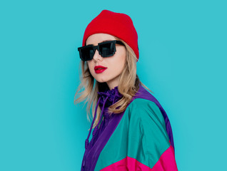 woman in red hat, sunglasses and suit of 90s