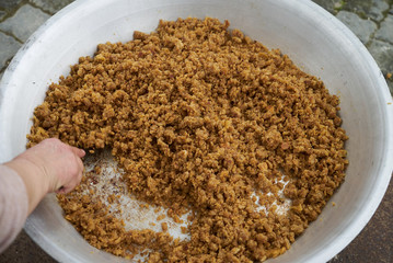 Traditional Azerbaijan food halwa cooking on bonfire, outdoors