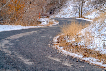 Curvy road on snowy mountain in Salt Lake City