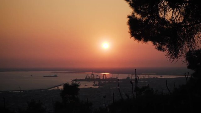 Thessaloniki / Greece 22 march 2019 : sunset pan in the most beautiful city of Greece photo taken from the hilltop forest Kedrinos Lofos, also known as Seich Sou,the temperture is fine for a walk