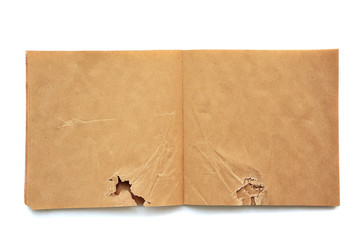 crumpled open brown skatchbook - 257559743